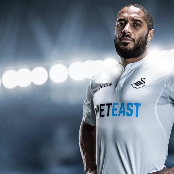 A photograph of Swansea City player from head on