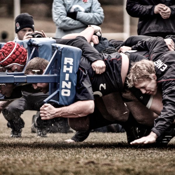 Photograph of the England Rugby team using a Rhino scrum machine