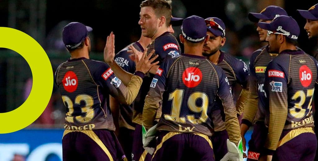 A photograph showing eight Kolkata Knight Rider players celebrating