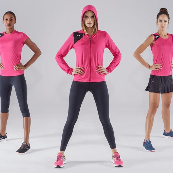 A photograph of three women wearing Joma teamwear