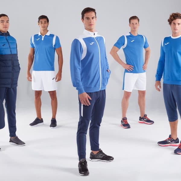 A photograph of five men wearing Joma teamwear
