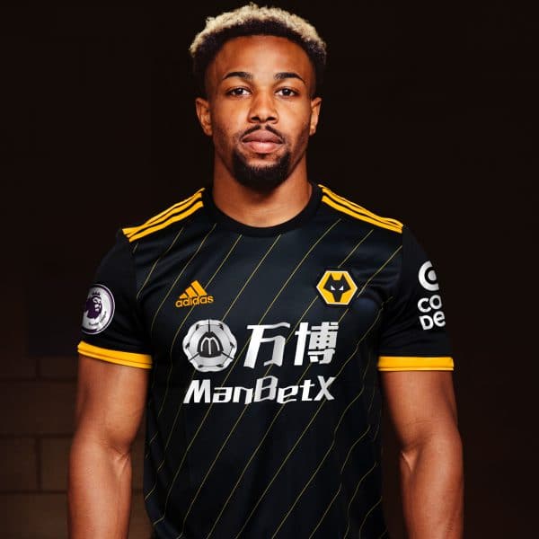 An image of a Wolves FC player in the away kit