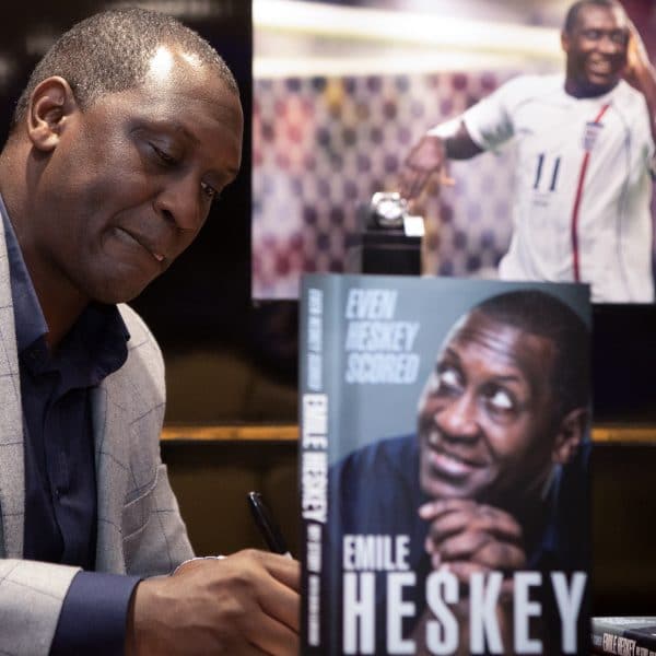 Photograph of Emile Heskey signing his new book